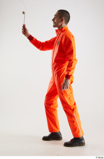 Shawn Jacobs Painter in Orange Pose 2 standing whole body…